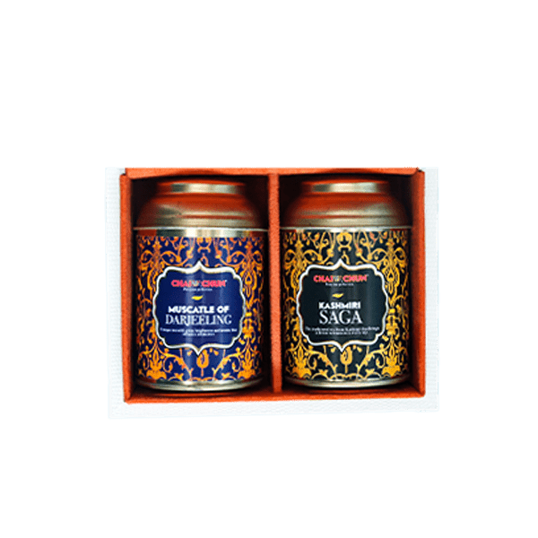 Two tea canisters, one labeled 'Muscatel of Darjeeling' and the other 'Kashmiri Saga', are presented in a decorative box.