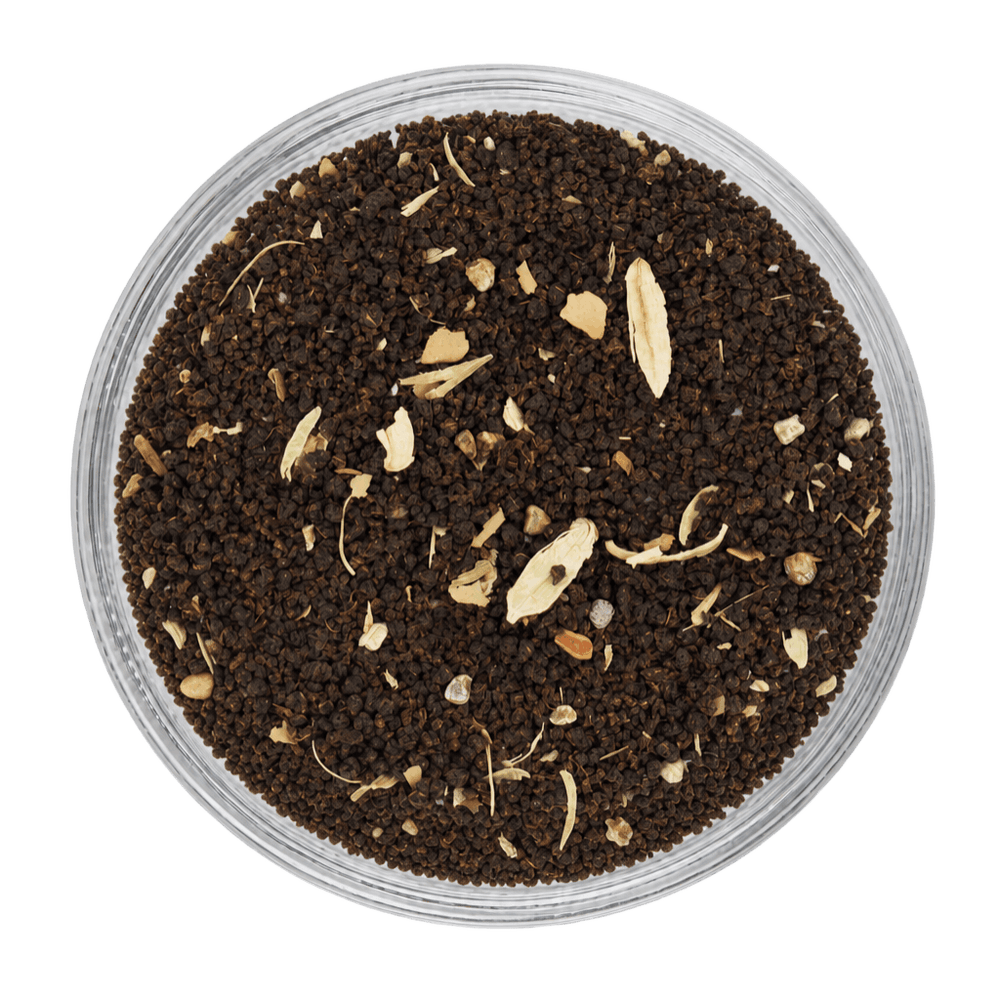 Premium Cardamom Tea dry leaves with fragrant cardamom pieces and rich tea leaves.