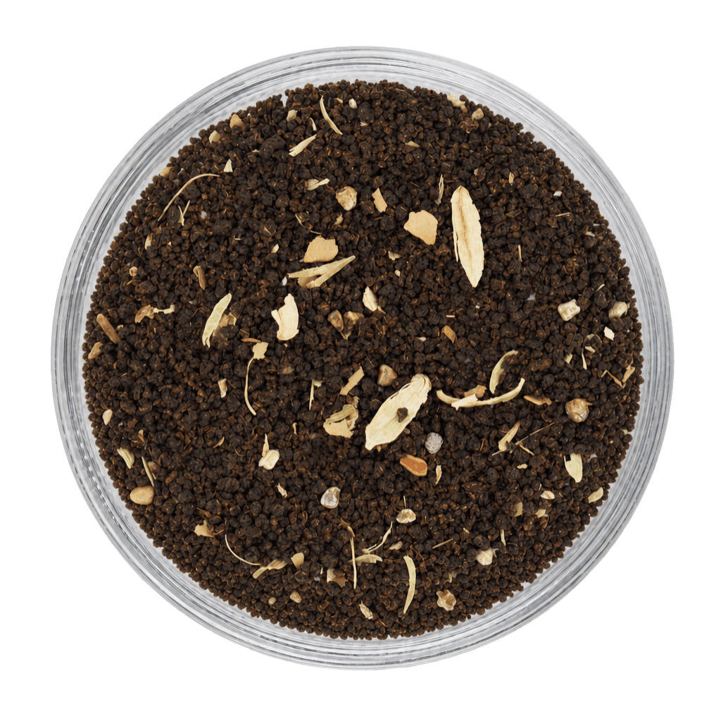 Premium Cardamom Tea dry leaves with fragrant cardamom pieces and rich tea leaves.
