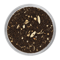 Premium Cardamom Tea dry leaves with fragrant cardamom pieces and rich tea leaves.