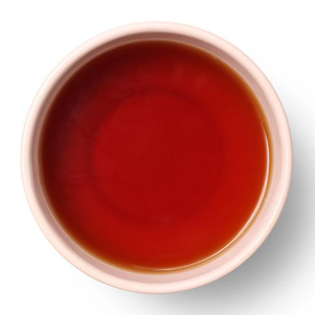 Golden amber liquor of Saffron Chai showcasing its smooth and aromatic character.