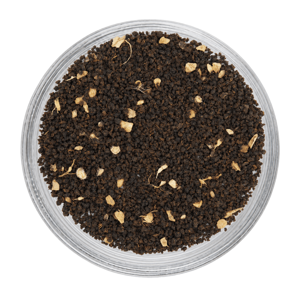 Close-up of ground black pepper in a transparent container on a white background