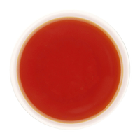A freshly brewed cup of Clove Protect Tea without milk, displaying a clear, bright reddish-brown to amber tea liquor with a smooth and inviting appearance.